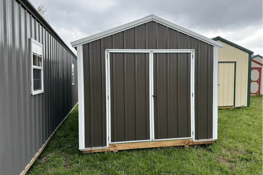 brown and white trimmed 10x16 utility sheds for sale in Conway, MO