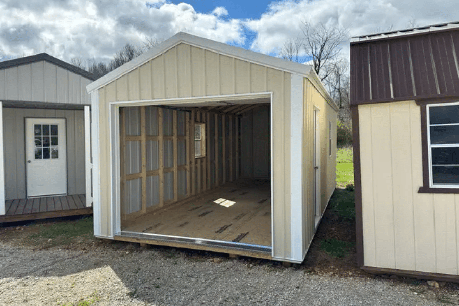 light yellow garage with white trim for sale in Conway, MO